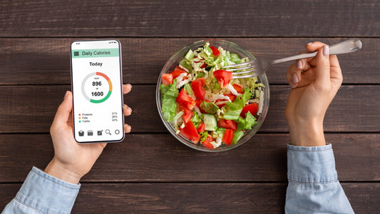 image of a person monitoring daily calorie intake and eating